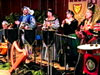 Players in period costume demonstrate the instruments and sounds of the 13th Century and discuss madrigals, canons, and ancient instruments.